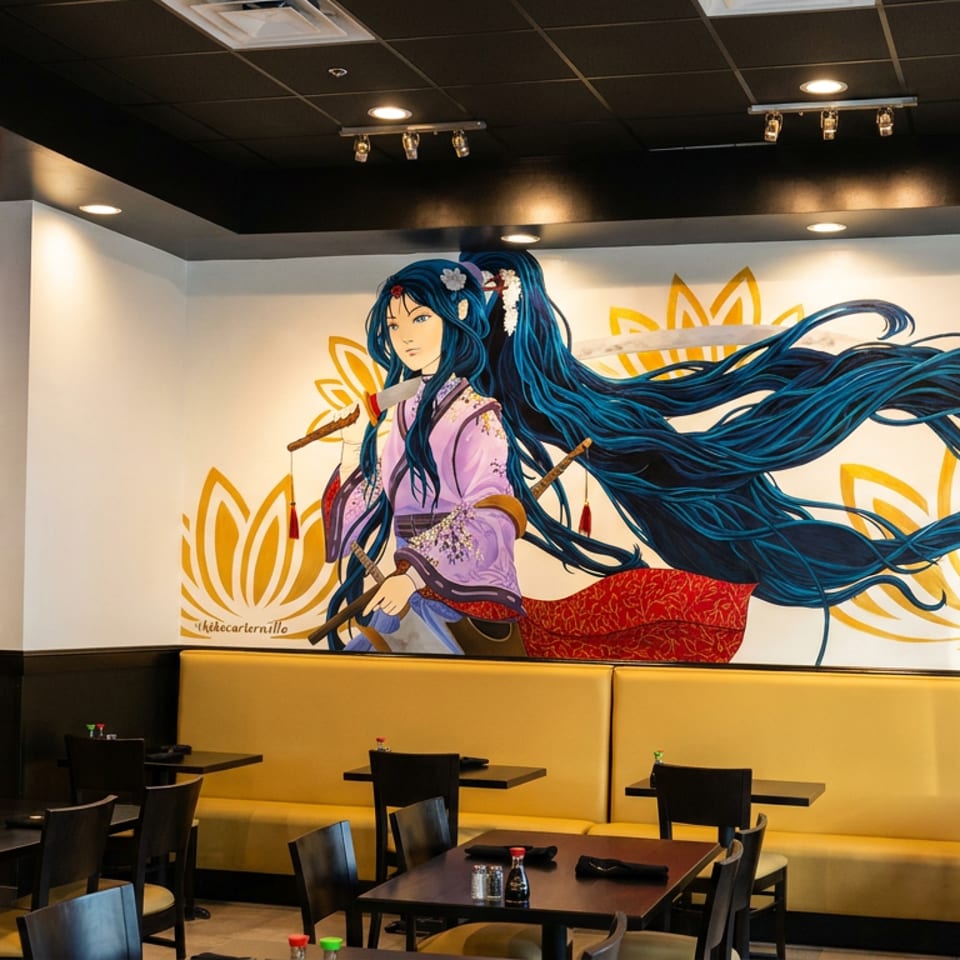 Restaurant dining area with yellow booths, black tables, and a large mural of an anime-inspired woman with flowing blue hair.